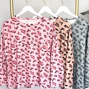 3 Women’s  XL Pink Animal Print top. Nice French Terry type material. NWOT
